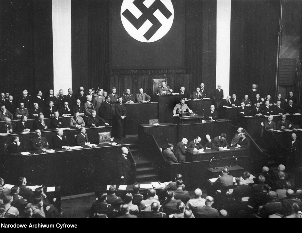 Adolf Hitler declares the Enabling Act at the Reichstag Kroll Opera House, Berlin. The amendment gave him full power to enact laws without the Reichstag, and was the first step to a dictatorship in Germany